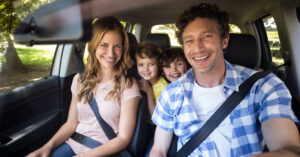 family in car