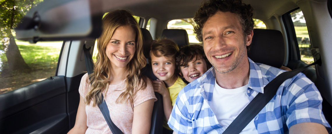 family in car